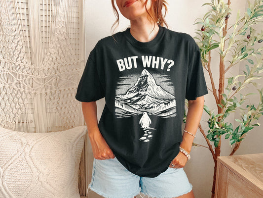 A Black Unisex Garment-Dyed T-shirt mockup (front view) showing the but why be the damn penguin shirt - sarcastic existential top print on the front. The artwork highlights sarcastic t-shirt, but why be the damn penguin shirt - sarcastic existential top, unisex garment-dyed t-shirt, black, but, why, be, the, damn, penguin, describing the graphic and theme on the garment.