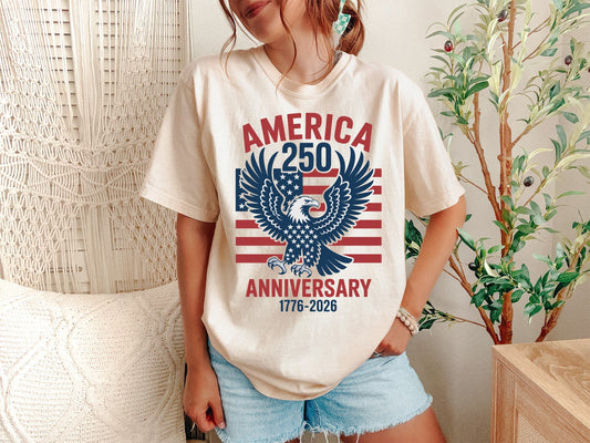 A high-impact patriotic graphic design for the America 250th Anniversary featuring the text 'AMERICA 250TH ANNIVERSARY' in red and white with stars and a flowing ribbon wave. This commemorative design celebrates the USA Semiquincentennial 1776-2026, perfect for patriotic clothing and 250 years of independence celebrations.

