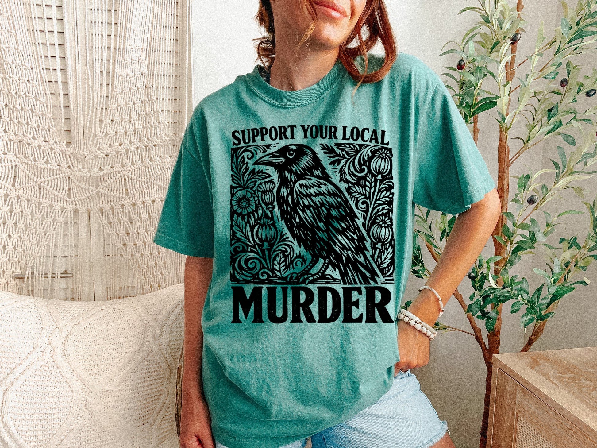 A Light Green Unisex Garment-Dyed T-shirt mockup (front view) showing the support your local murder crow shirt - funny bird lover gift tee print on the front. The artwork highlights vintage crow shirt, nature lover gift, crows before bros, support your local murder crow shirt - funny bird lover gift tee, unisex garment-dyed t-shirt, light green, support, your, local, murder, describing the graphic and theme on the garment.